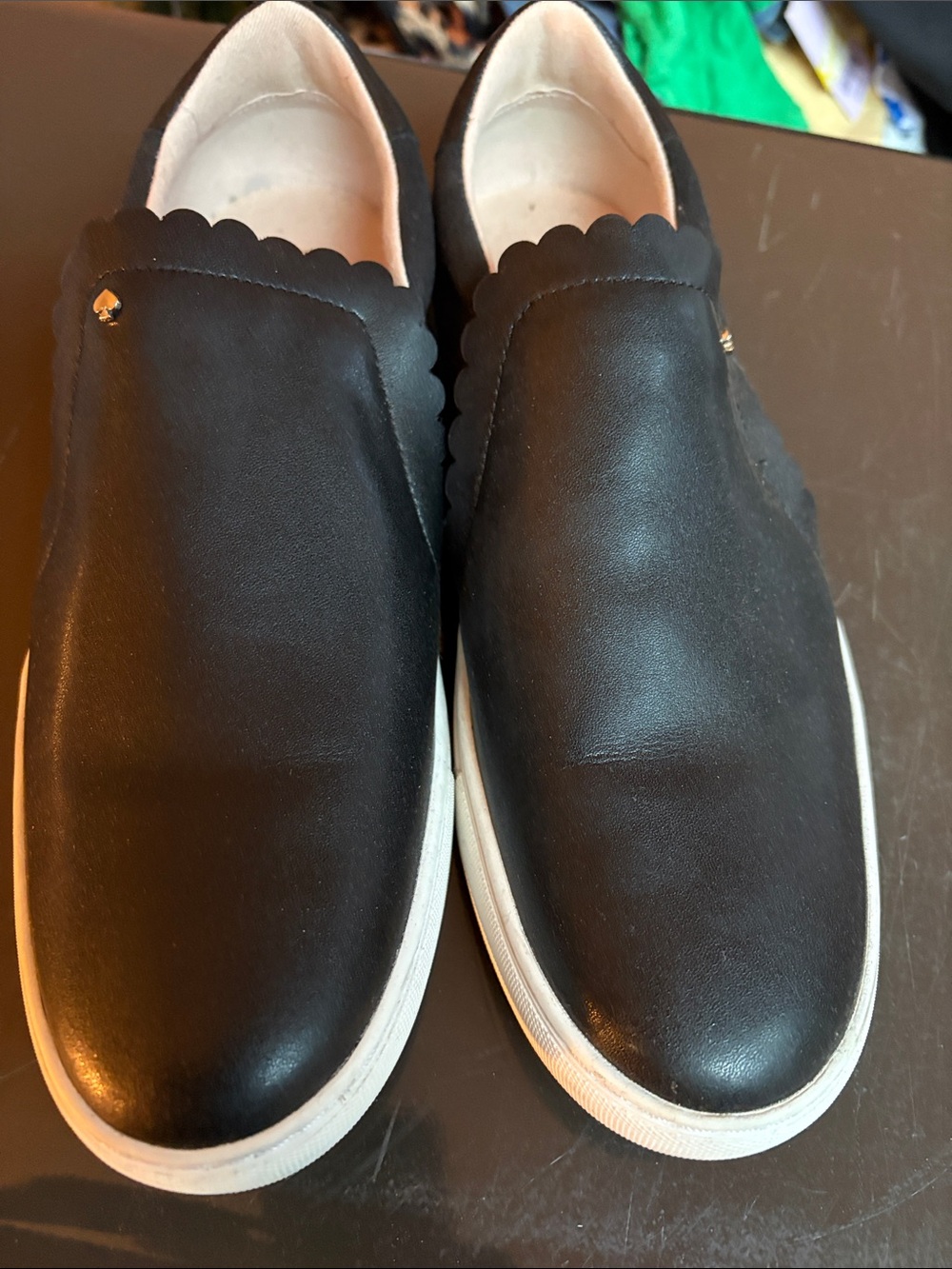kate spade Black Slip-On Sneakers with Gold Logo